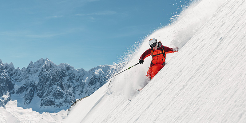 Premium Photo  Freeride snowboarder sliding down the mountain slope